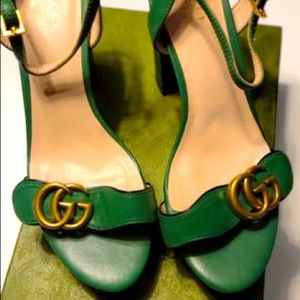 Green designer heels/sandals.